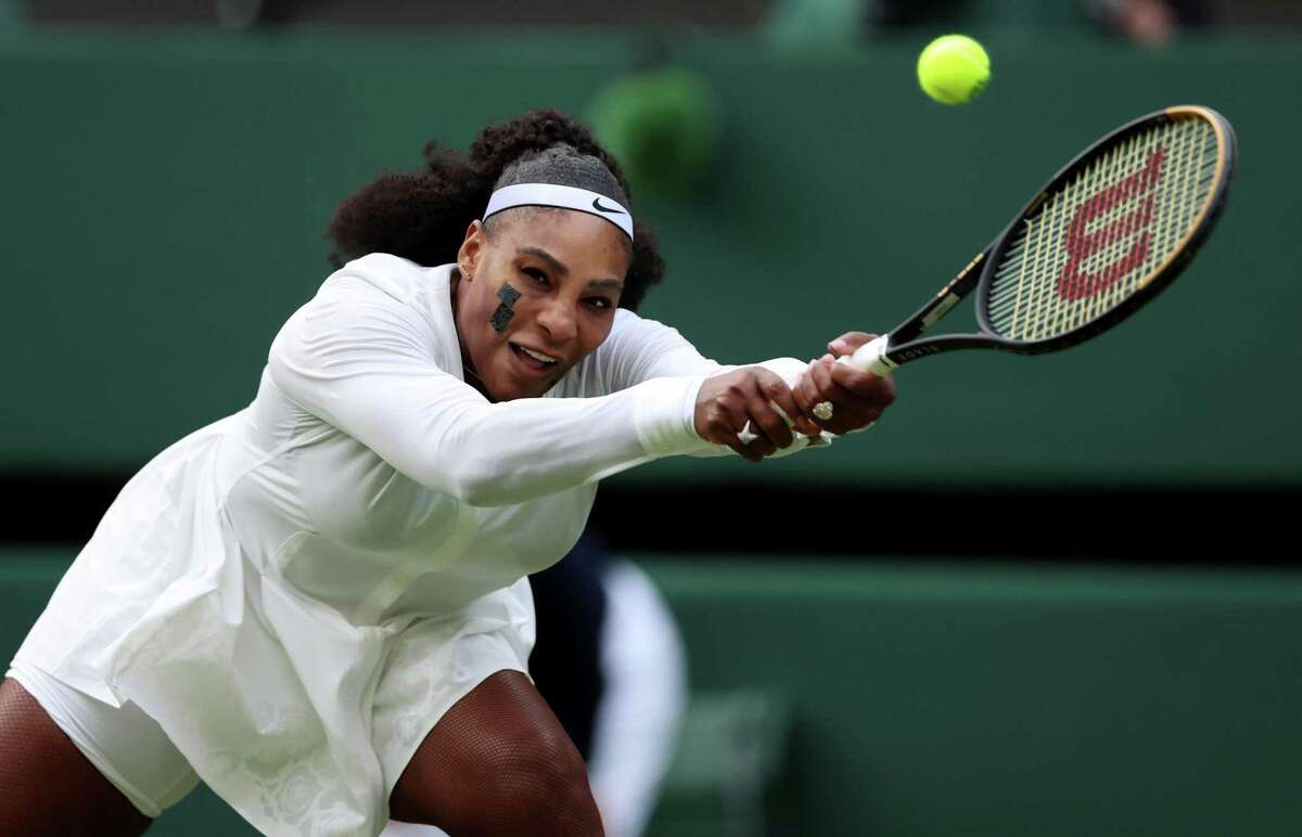 LONDON, ENGLAND - JUNE 28: Serena Williams of United States plays a backhand against Harmony Tan of France during their Women's Singles First Round Match on day two of The Championships Wimbledon 2022 at All England Lawn Tennis and Croquet Club on June 28, 2022 in London, England. (Photo by Clive Brunskill/Getty Images)
