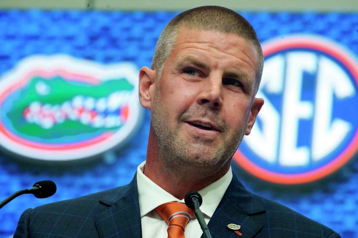 Florida coach Billy Napier likes his closely cropped hairdo because it requires so little time.
