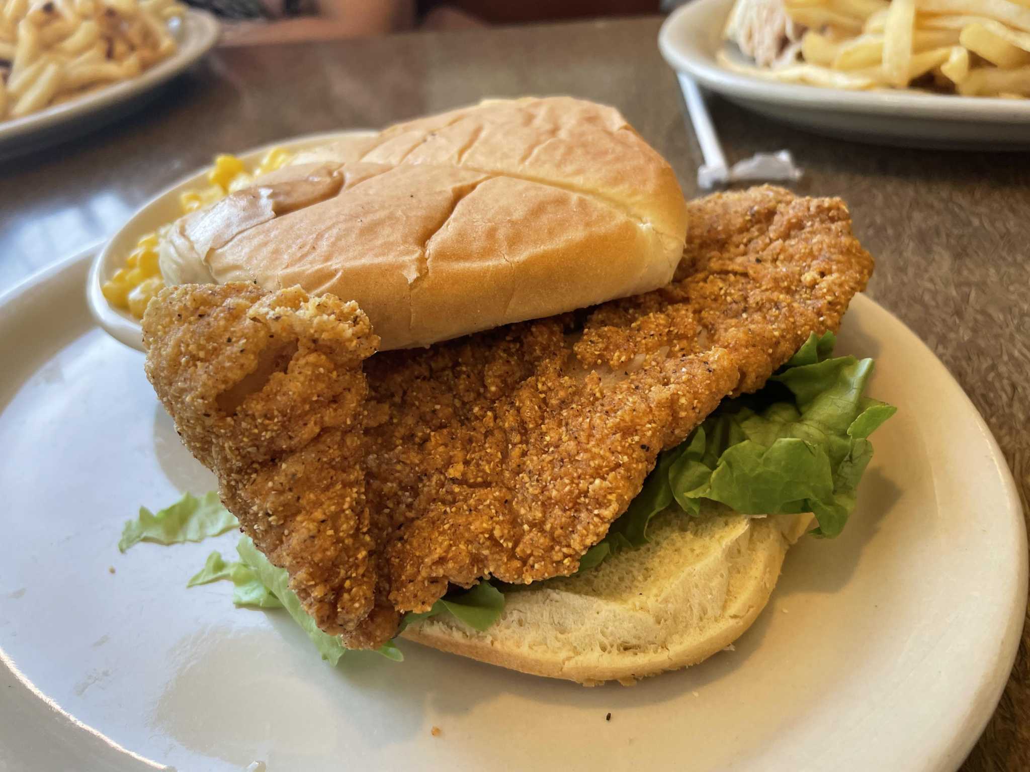 Jim’s Eating places reels on this critic with an incredible catfish sandwich, enormous membership sammie, crispy bacon