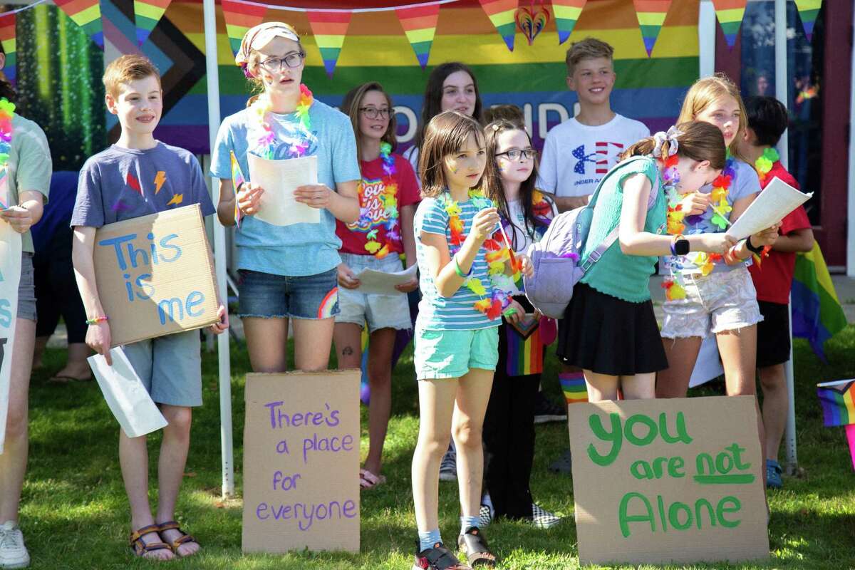 Members of the Wilton Children's Theater perform at a June Pride event held in Wilton and hosted by a local Girl Scouts Troop.
