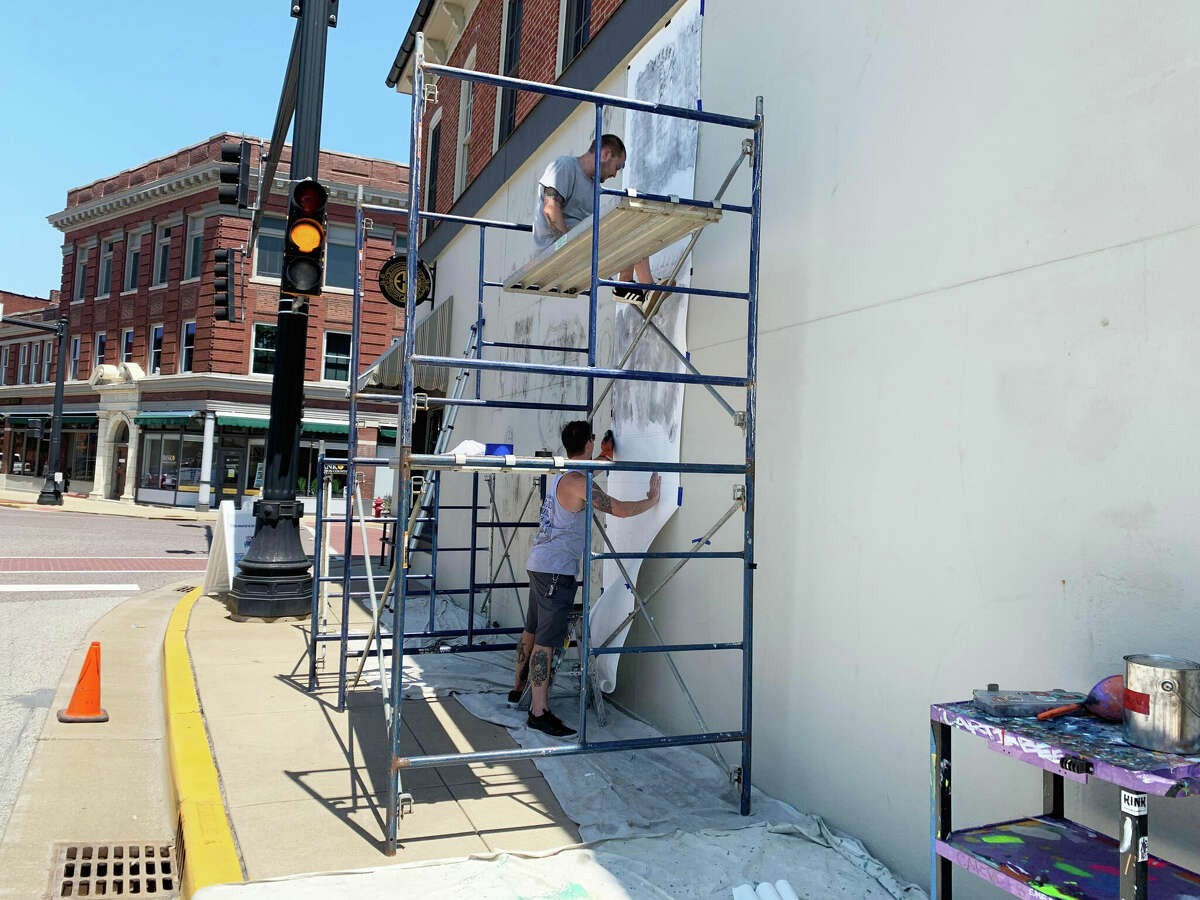 Progress on the Route 66 mural at the southwest corner of West Vandalia and South Main streets began on Thursday. It's a near week-long process. 