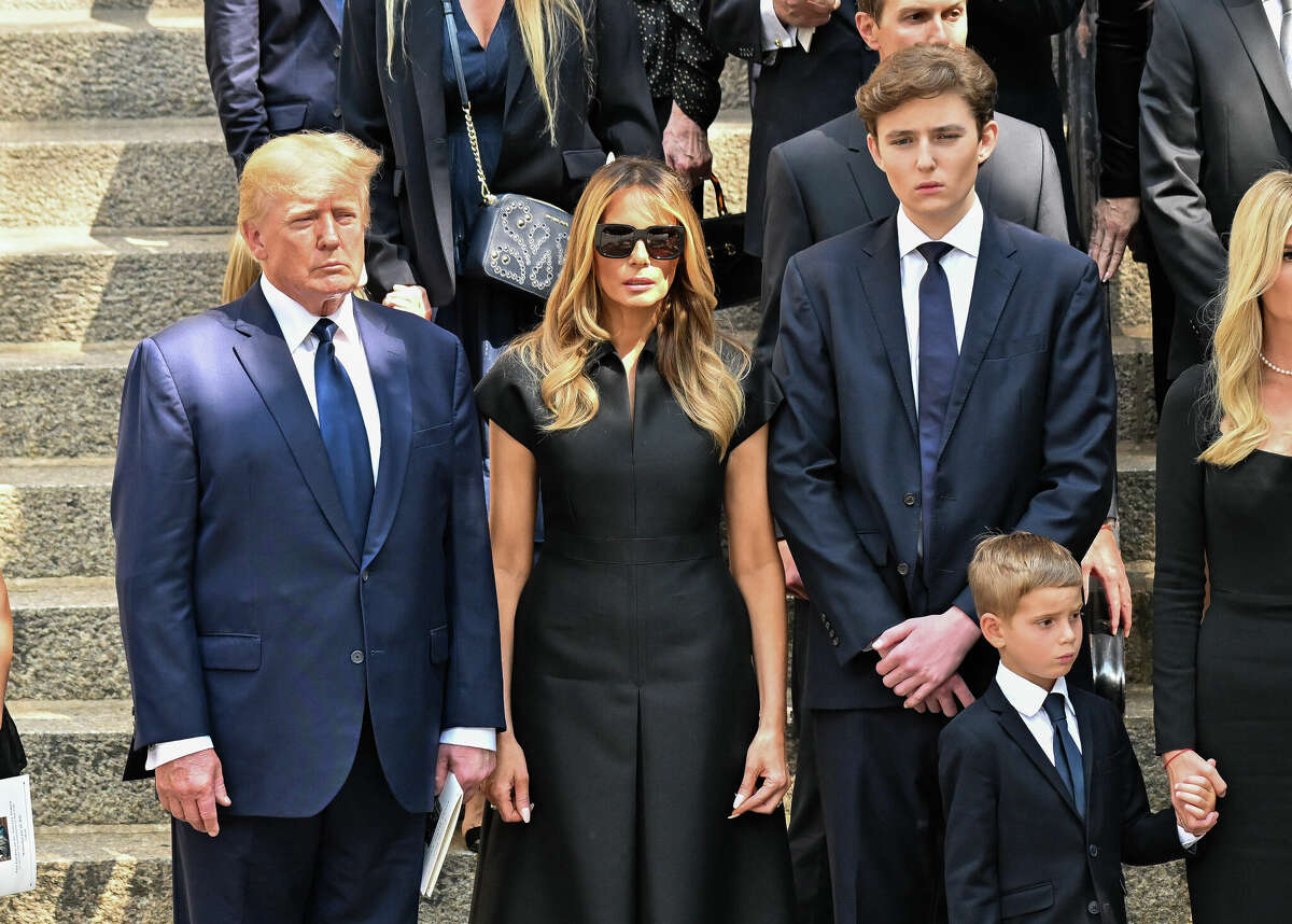 NEW YORK, NEW YORK - JULY 20: Former U.S. President Donald Trump, former U.S. First Lady Melania Trump and Barron Trump are seen at the funeral of Ivana Trump on July 20, 2022 in New York City. (Photo by James Devaney/GC Images)