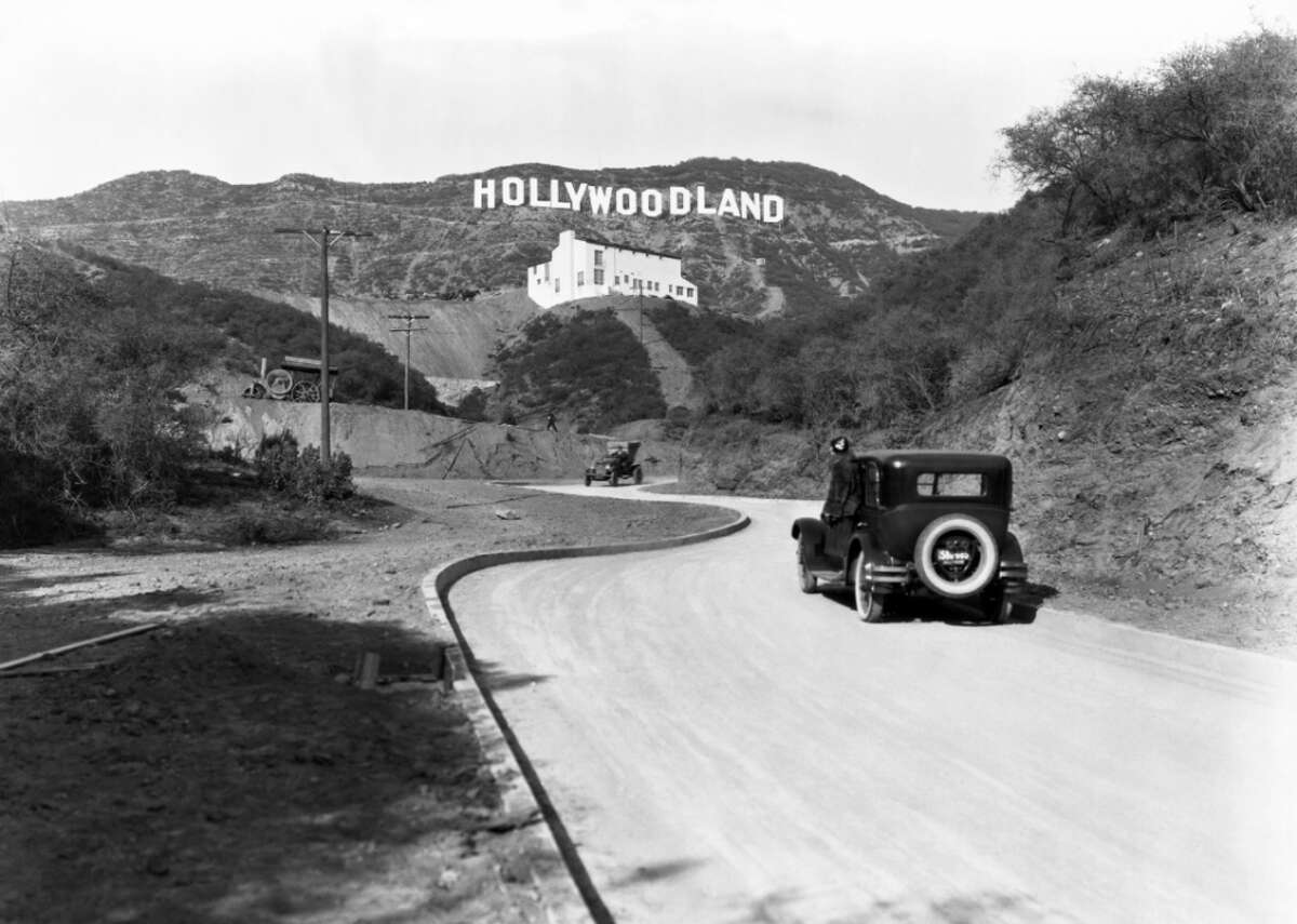20 photos of LA in the 1920s The 1920s marked a huge period of growth for the city of Los Angeles. At the start of the decade, just over half a million people called the sunny, Southern California town home. By 1930, that number had jumped to just over 1.2 million. Gone were the days of LA as a farming town, changed forever by the arrival of the film, oil, and aviation industries. Without a doubt, one of the most famous industries to stem from LA's growth was the motion picture business. While filmmakers first began migrating to SoCal in the late 1910s, the '20s brought the big studios, major stars, and all the money. If not for studio heads' desire to escape the Northeast's temperamental weather and patent restrictions, LA certainly wouldn't be the city we know it to be today. With that massive population growth came a number of other changes—the suburban sprawl, a reliance on automobiles and the freeways constructed to get those automobiles around the spread-out city, and a burgeoning desire for luxury and leisure. It can be hard to put into words just how unique LA was in the 1920s. For that reason, Giggster combed historical archives to create a collection of pictures that best demonstrate what life was like in the City of Angels during the decade. From snaps of old Hollywood to glimpses of everyday life, these photos perfectly exemplify the history of the nation's second-largest city.