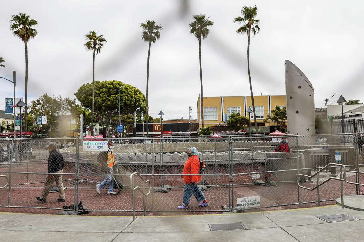 A fence at the 24th Street Mission BART Station plaza has been installed to deter illegal vending and open-air drug use.