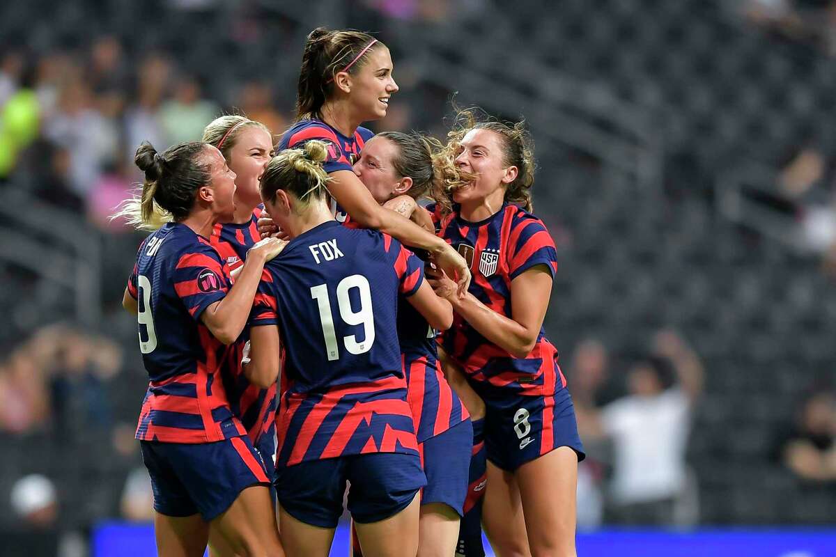 MONTERREY, MEXICO - JULY 18: Alex Morgan of USA celebrates with teammates after scoring her team's first goal during the championship match between United States and Canada as part of the 2022 Concacaf W Championship at BBVA Stadium on July 18, 2022 in Monterrey, Mexico. (Photo by Azael Rodriguez/Getty Images)