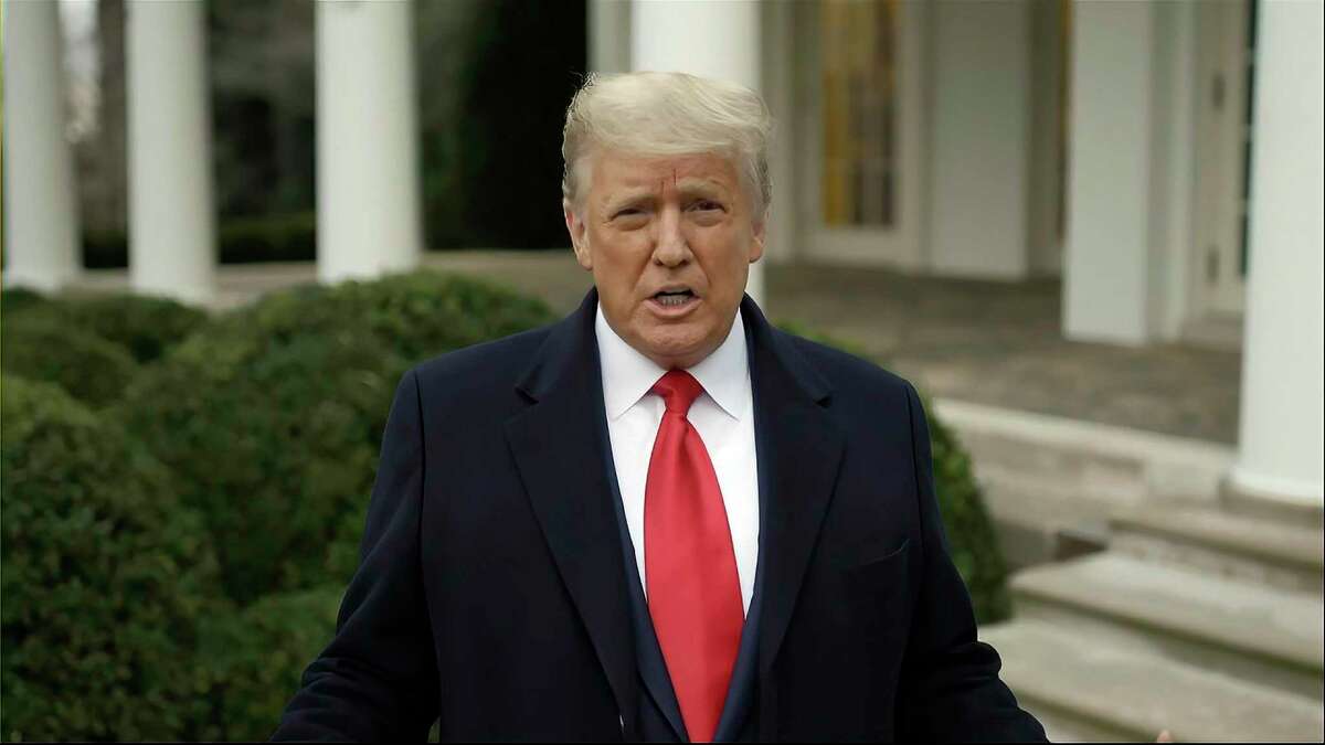 This exhibit from video released by the House Select Committee, shows President Donald Trump recording a video statement on the afternoon of Jan. 6, from the Rose Garden, displayed at a hearing by the House select committee investigating the Jan. 6 attack on the U.S. Capitol, Thursday, July 21, 2022, on Capitol Hill in Washington. (House Select Committee via AP)