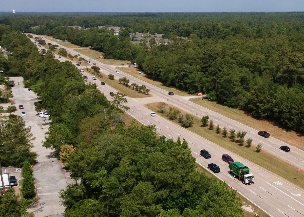 Traffic is seen along Texas 242 west of I-45, Friday, July 22, 2022, in The Woodlands. The Texas Department of Transportation inches closer to a $40 million project that would widen Texas 242 from FM 1488 to Interstate 45, state Rep. Steve Toth said the solution is not more lanes through The Woodlands but rather a loop around the community. The project would add a lane of traffic in each direction, include 12-foot travel lanes with 10-foot shoulders, open ditch drainage, three detention ponds, a pathway along the north side of the road and potential sound wall for residents along the project’s route.