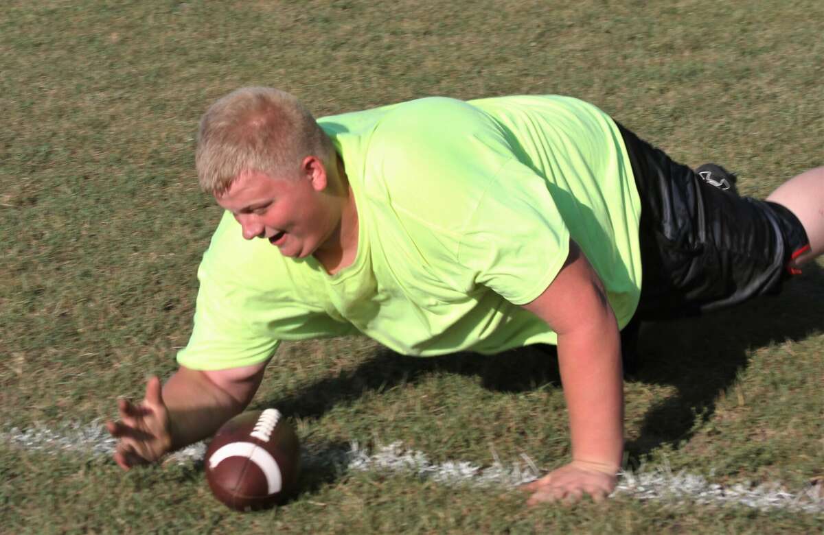 A Brethren defensive lineman dives for a losse ball in practice
