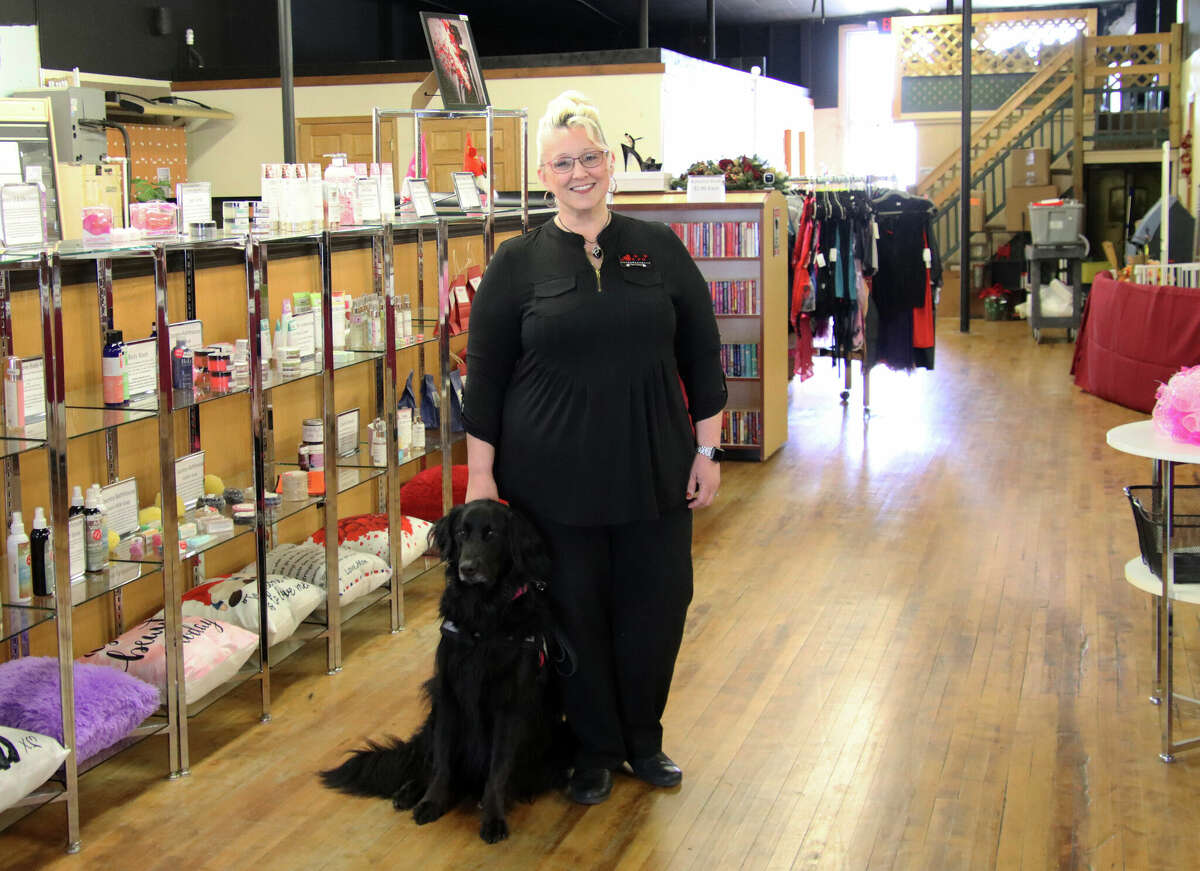 Lisa’s Love Boutique & Studio is growing, moving from its original home on Pigeon Road west of Elkton to the south side of Huron Avenue near the intersection with Port Crescent Street in downtown Bad Axe. Above, owner Lisa Csanyi poses with her dog, Sydney.