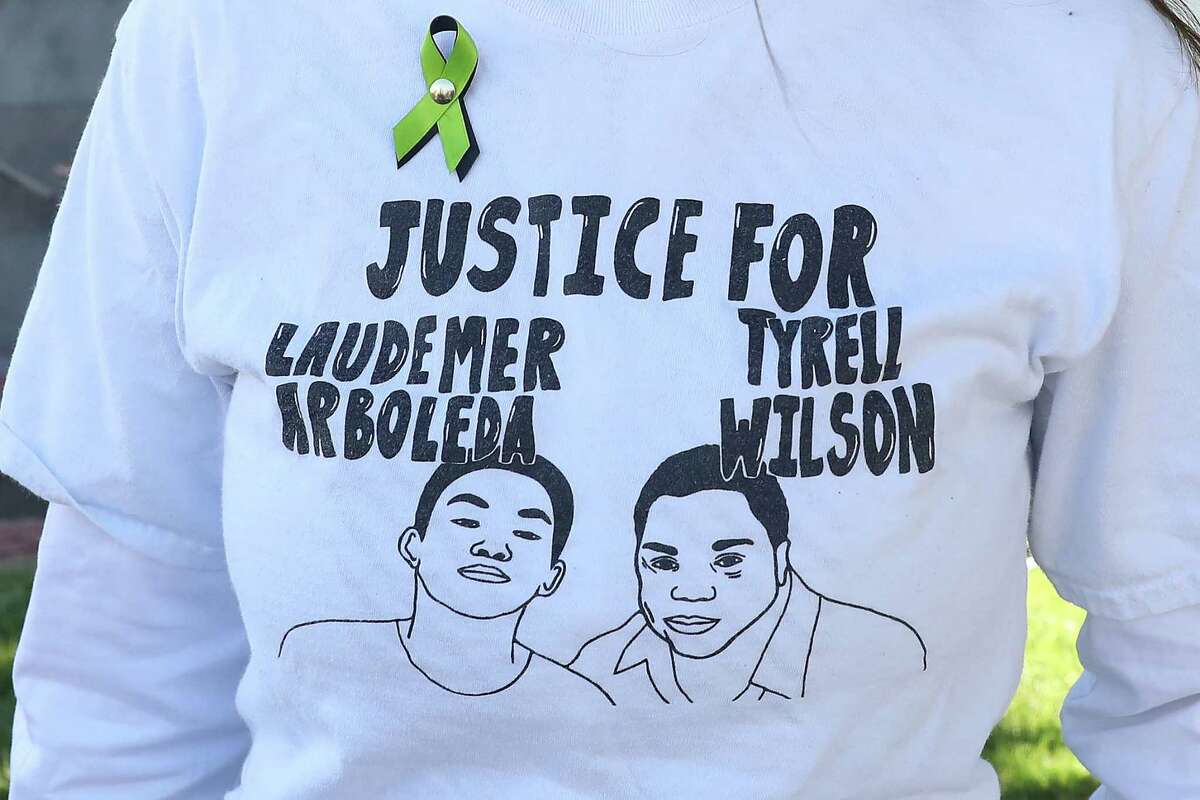 Sarah Stroin, coordinator Conscious Contra Costa, wears a shirt asking for Justice for Laudemer Arboleda and Tyrell Wilson outside the Wakefield Taylor Courthouse before the coroner’s inquest regarding Tyrell Wilson on Thursday, July 21, 2022 in Martinez, Calif.