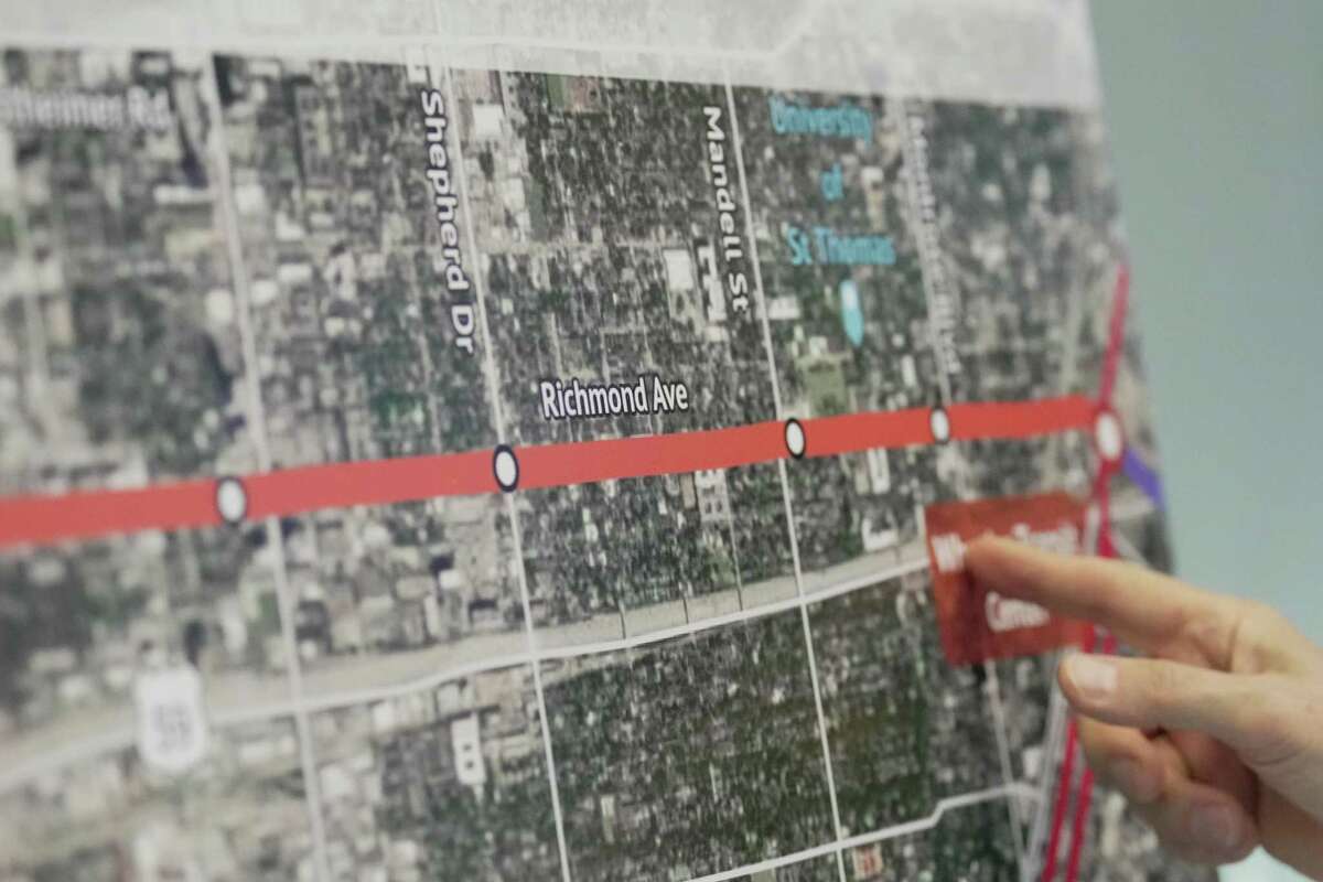 William Stewart points at a presentation of proposed route for Segment 2 of METRORapid University Corridor Project at an open house to learn and ask about the project on Wednesday, July 20, 2022, at Houston Community College Central Campus in Houston. Segment 2 runs on Richmond Avenue between Montrose Boulevard and Edloe Street. Metropolitan Transit Authority's planned University Line will be among the largest bus rapid transit routes in the nation, connecting numerous neighborhoods and transit centers. Skeptics, however, wonder if the $1.5 billion-plus project will ever attract riders to justify the huge expense, as opposed to simply better bus service.