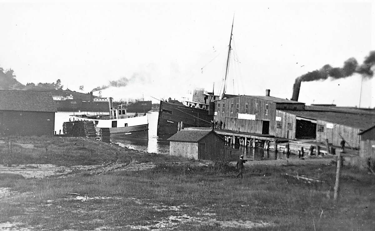 Michigan Transportation Co. dock at the foot of Fourth Street in Frankfort in 1910. The passenger steamer Missouri is tied up in front. Many people arrived at or left Frankfort from this dock.