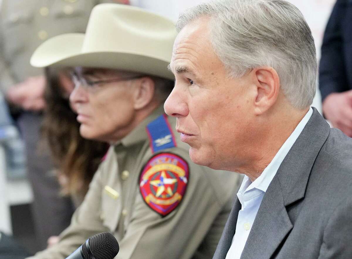 Texas Gov. Greg Abbott answers questions during a press conference at DPS Crime Lab on Thursday, July 14, 2022 in Houston.