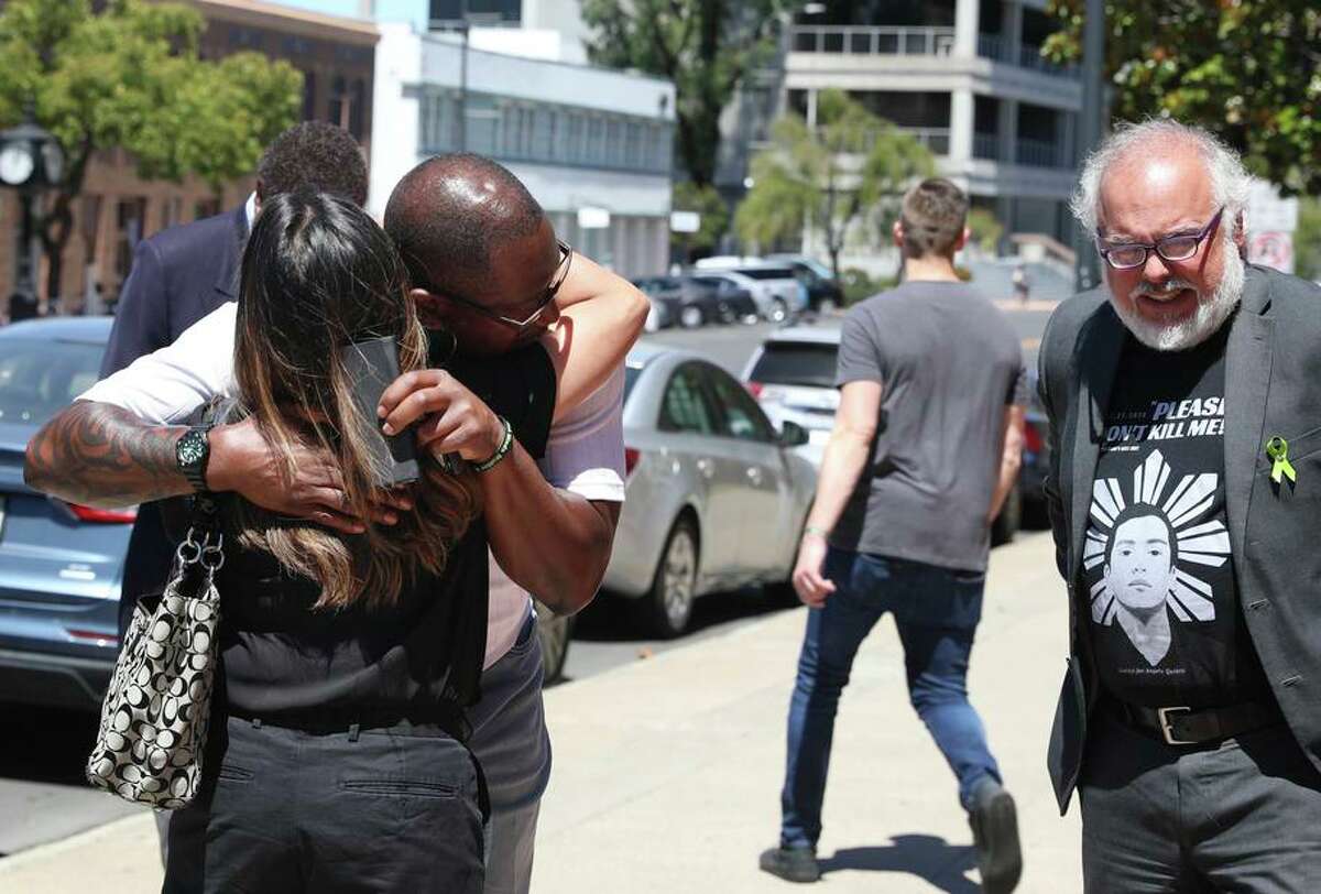 Marvin Wilson embraces Cassandra Quinto-Collins, whose son died in an encounter after being pinned down Antioch police, outside the Wakefield Taylor Courthouse after a jury ruled his son Tyrell Wilson’s death to be a homicide following a coroner’s inquest in Martinez on Friday, July 22, 2022. A former deputy fatally shot Wilson in March 2021.