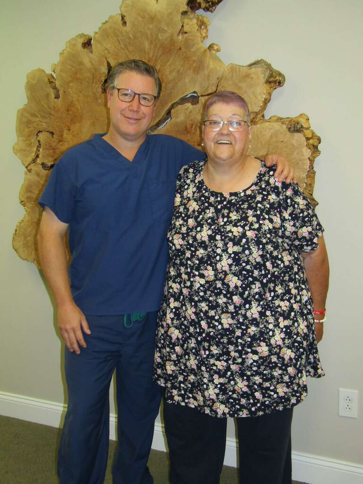 From left, Marshall Kurtz and New Milford resident Concetta "Connie" Main reunited in Greater Connecticut Oral & Dental Implant Surgery's New Milford office on July 19, over a month since Main's restorative dental surgery.
