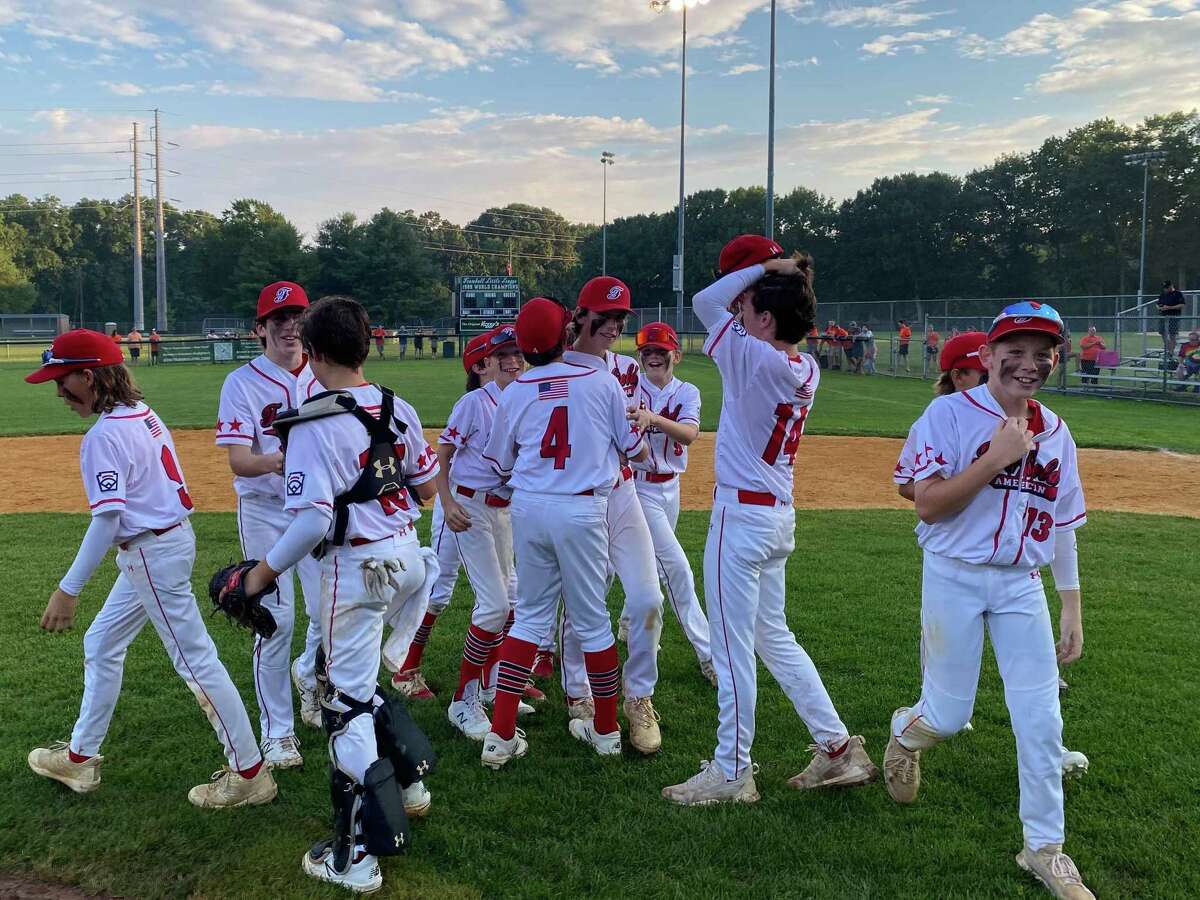Members of the Fairfield American Little League team celebrate their 2-0 win over Ridgefield in the Section 1 championship game. Fairfield American advances to the state final four.