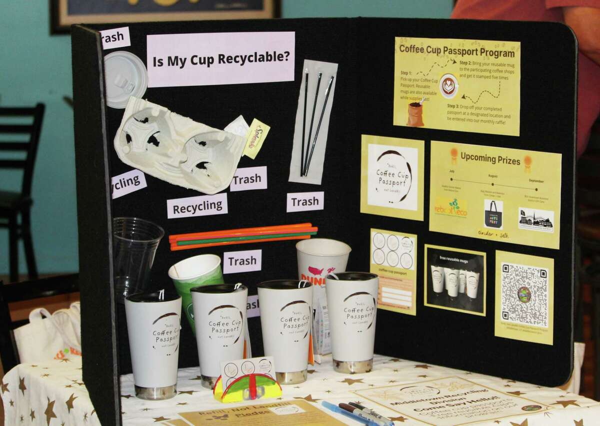 The Middletown Recycling Department launched its “Refill, Not Landfill Coffee Cup Passport” program Thursday at Perk on Main. This display demonstrates recyclable and nonrecyclable items that end up in the trash stream.
