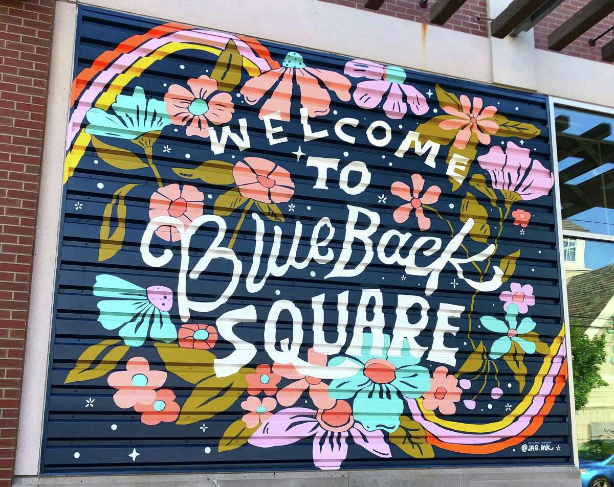 Jillian Goeler painted the first mural in Blue Back Square.