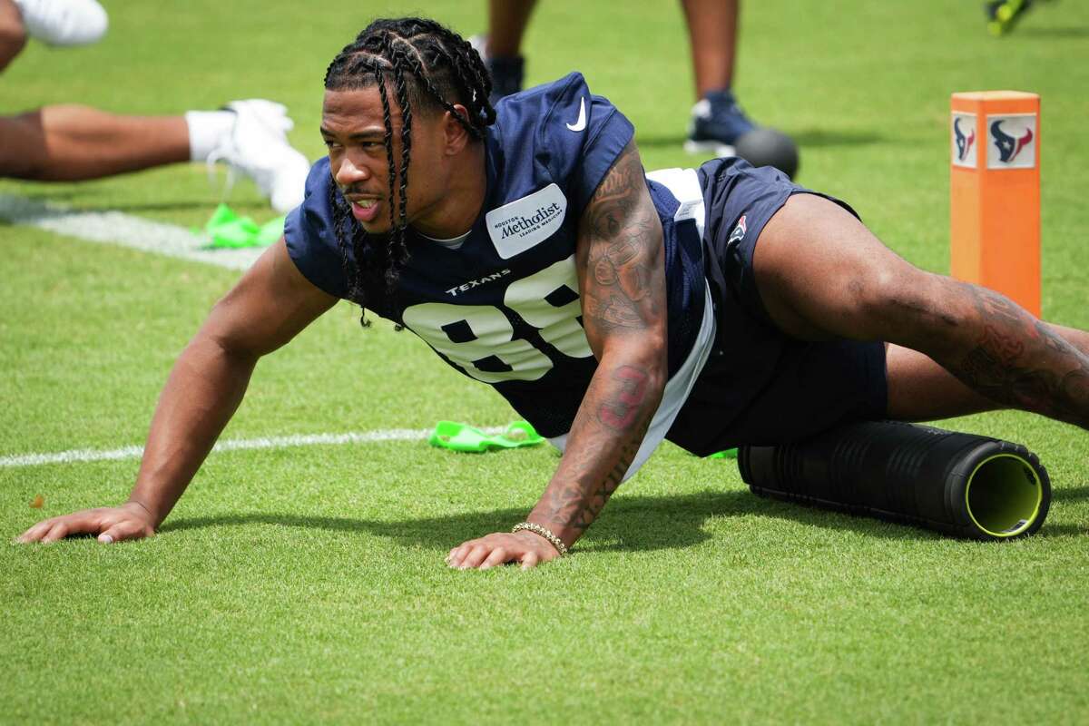 Houston Texans wide receiver John Metchie III stretches during Texans Rookie Mini Camp Friday, May 13, 2022 in Houston.