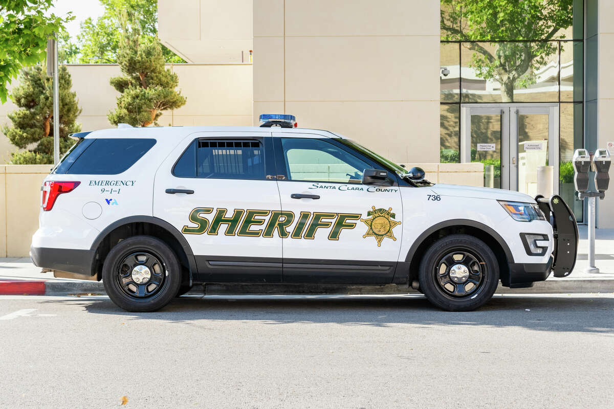 FILE: A Santa Clara County police car parked on a street near downtown.