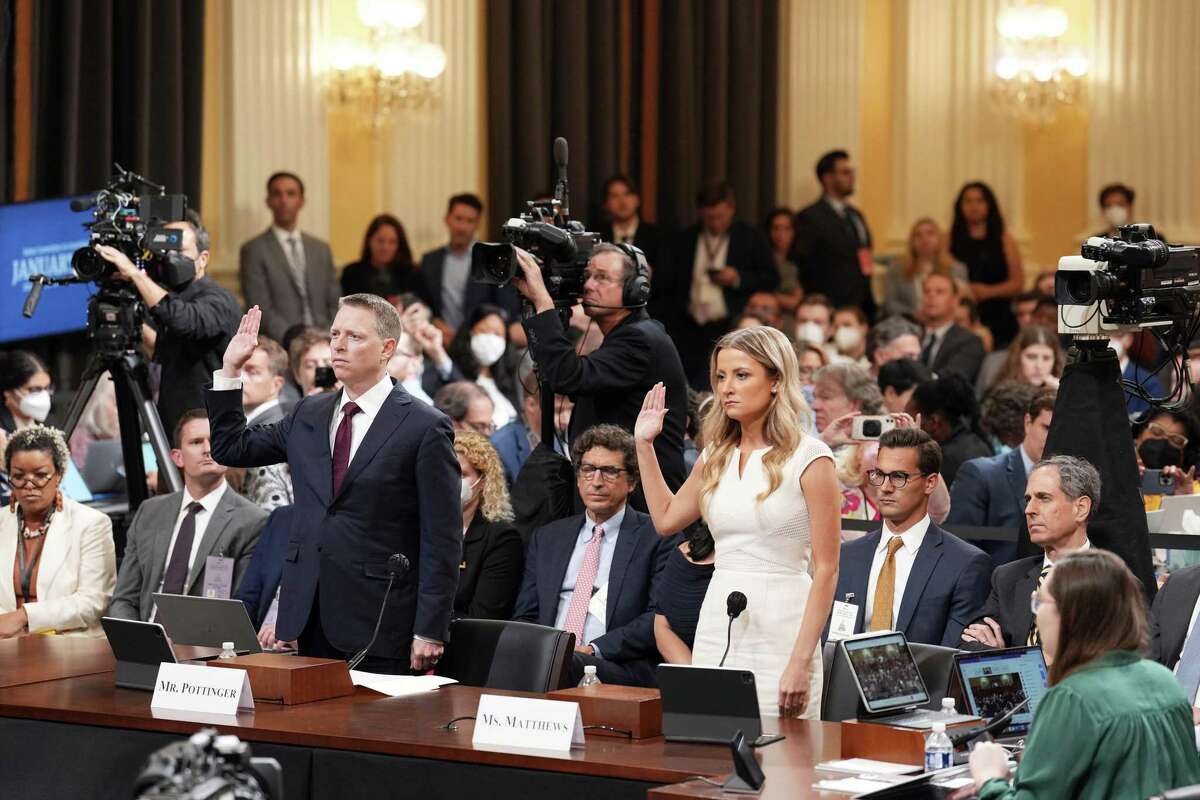 Matthew Pottinger, left, and Sarah Matthews are sworn in to testify before the U.S. House Select Committee investigating the Jan. 6 attack on the Capitol during the committee’s hearing on Capitol Hill in Washington, D.C., Thursday, July, 21, 2022.