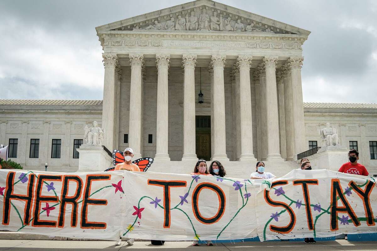 DACA recipients and their supporters rally outside the U.S. Supreme Court in Washington, D.C., on June 18, 2020.