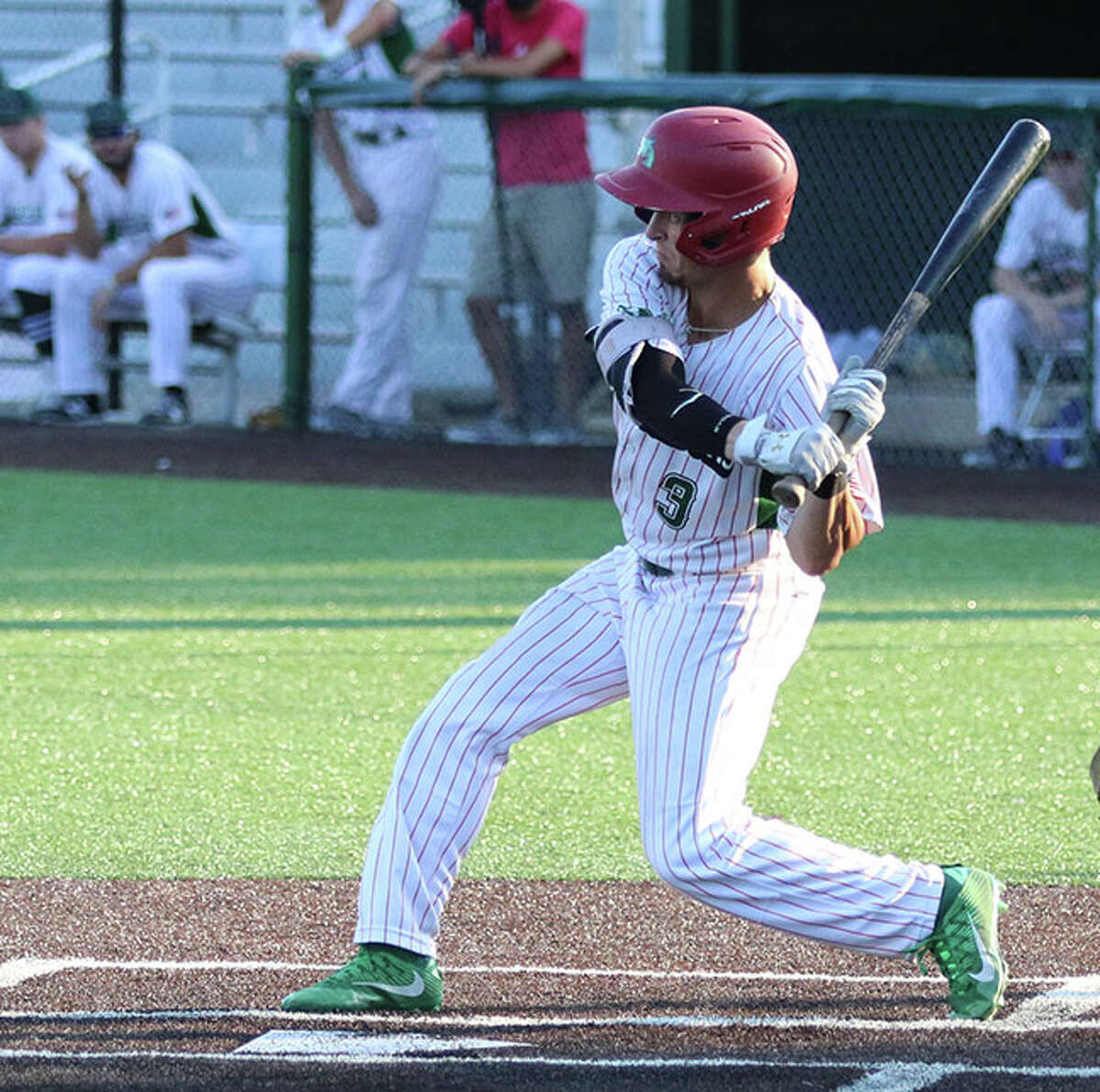 The River Dragons' Mike Hampton, an Alton High grad, had a home run and three RBI on Monday night in the Dragons' win over Quincy at Hopkins Field in Alton.