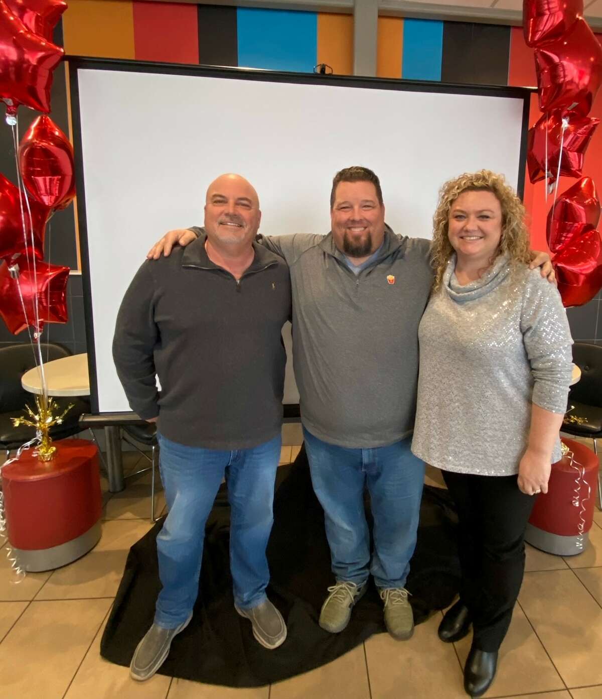 Trish Hollingsworth and her husband Greg Hollingsworth (middle) and dad Jim Luth (left).
