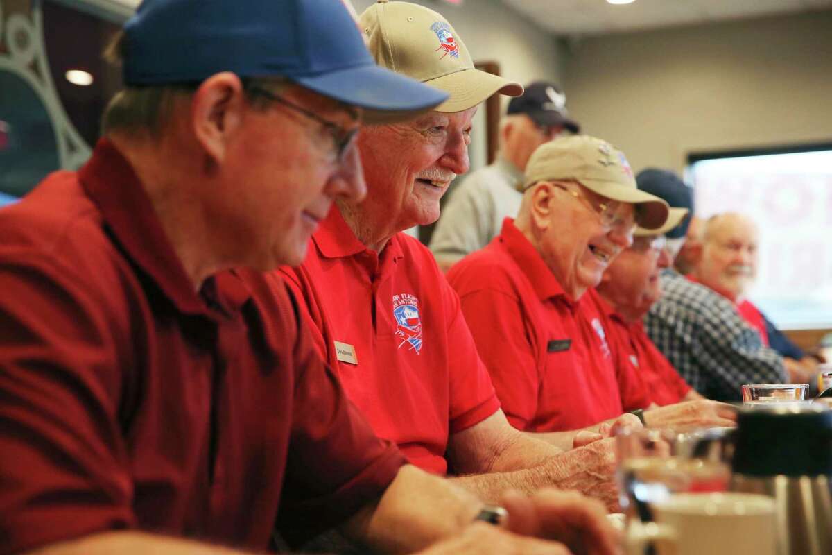 Navy veteran Don Stevens, 90, center, joins other veterans for a monthly breakfast gathering in New Braunfels last week. Stevens was a medical corpsman aboard a hospital ship anchored off the coast during the Korean War. With him are Air Force veterans Dennis Lehr, 69, left, and Richard Lavdar, 84, right.