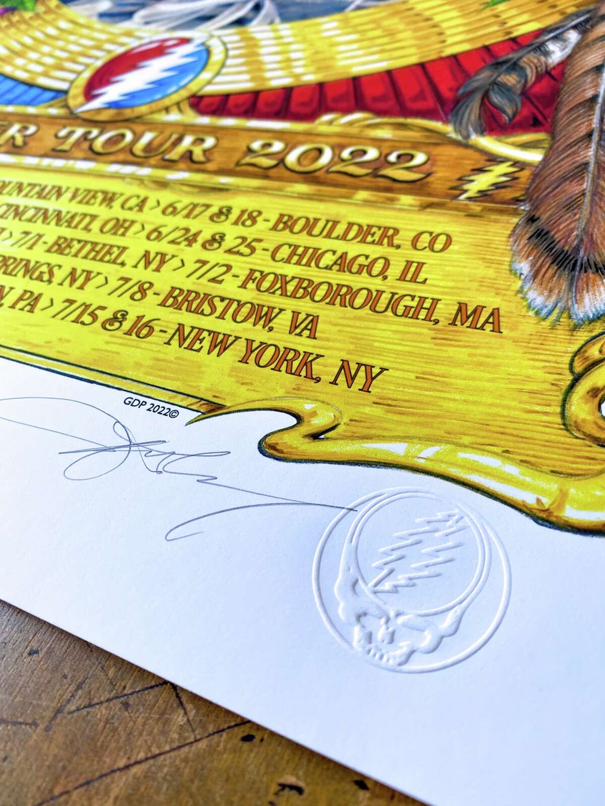 A "Steal Your Face" embellished on AJ Masthay's 2022 summer tour poster for Dead & Company