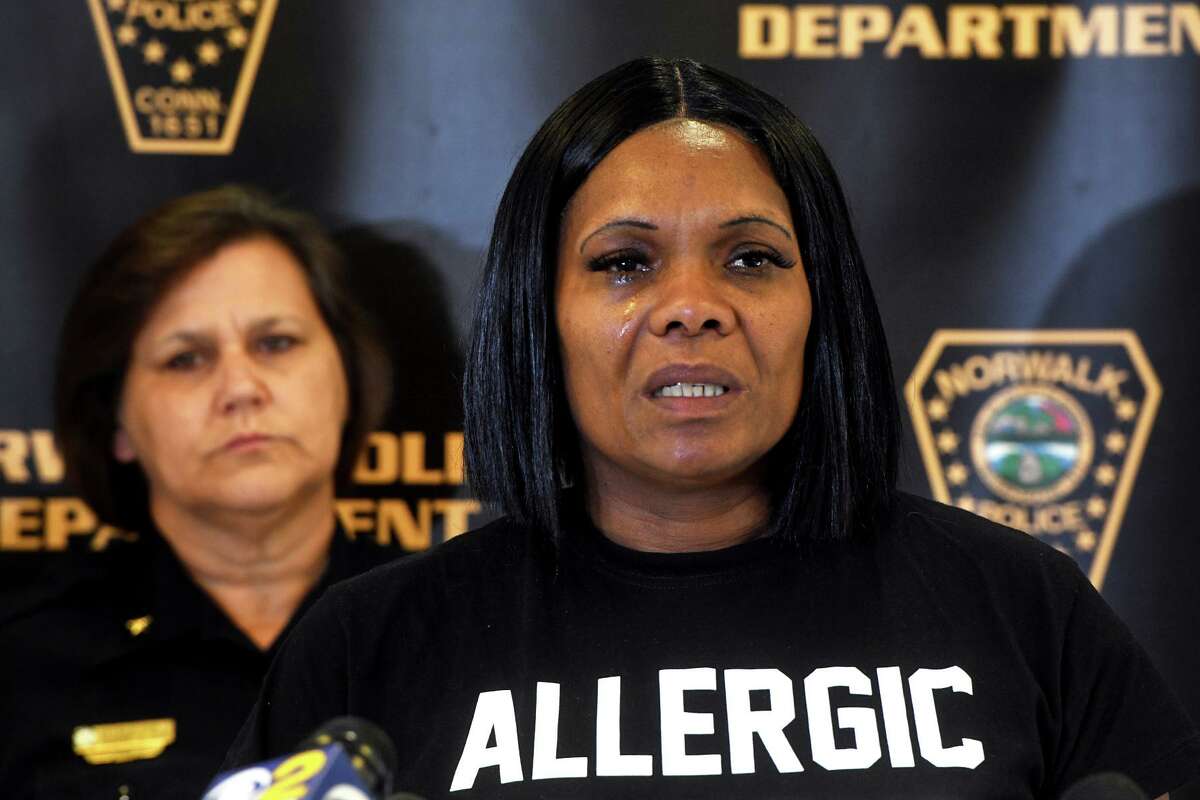 April Barron, of Bridgeport, mother of Iroquois Alston, speaks during a news conference at Police Headquarters, in Norwalk, Conn. July 26, 2022. Alston was shot and killed along with Rickita Smalls in Norwalk in August of 2011. Their murders remain unsolved.