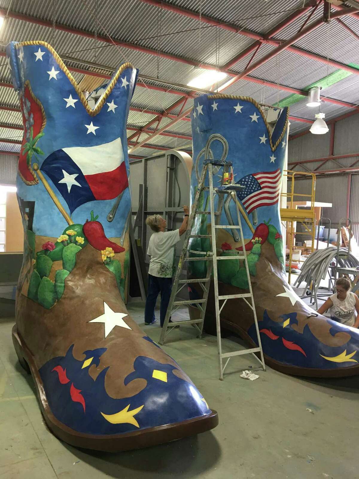 Boerne-based SRO Associates, which provides creative and construction services, is the creator of the size 96 Lucchese boots that Big Texas will be sporting at this year's state fair. Artist Erin Andreas works on the boots.