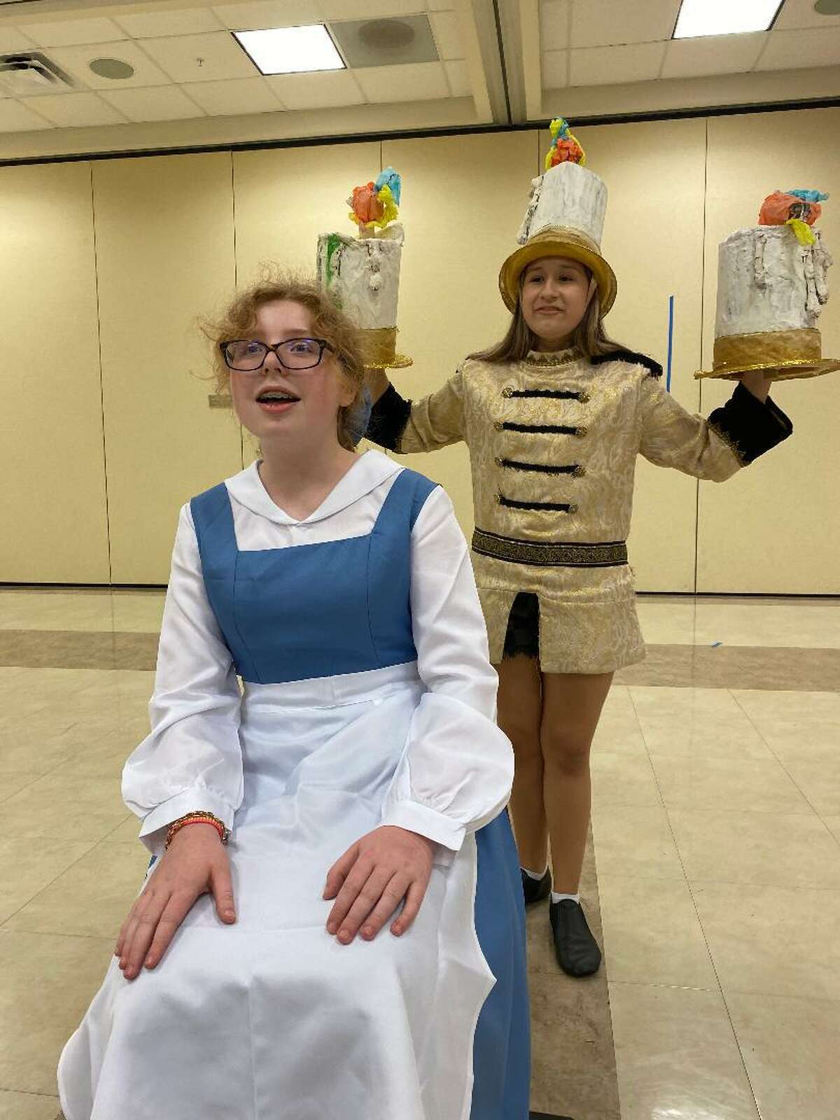 Maria Johnigan as Belle and Catelyn Stensgaard as Lumiere will perform in Kids’ Backporch Productions' “Disney’s Beauty and the Beast JR.” July 29-31 at C.A. Nelson Auditorium at Pearland Junior High West.