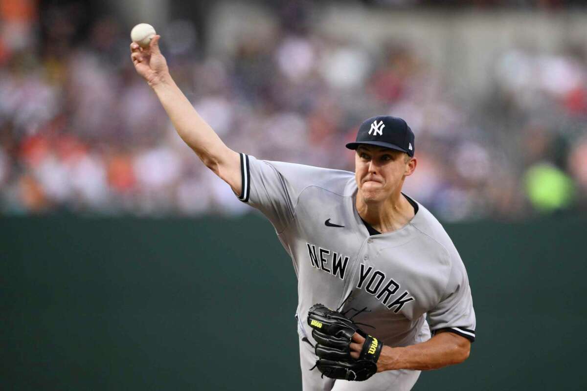 The Woodlands' Jameson Taillon pitches during a night game April