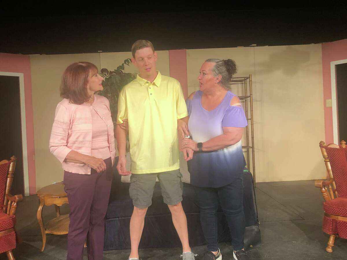 Bill (Craig Loeffler) is being fought over by his Mother (l, Jane Moore) and mother-in-law (Kim Blackketter)