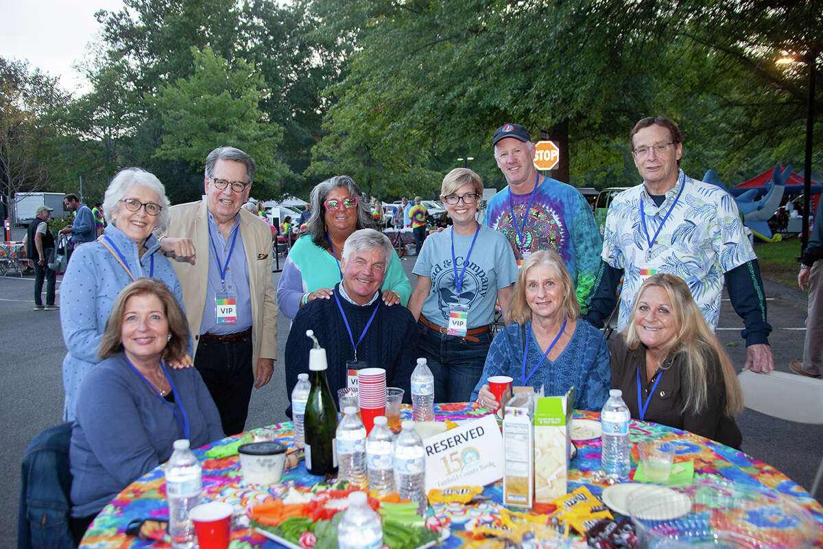 Several members of the Riverbrook Regional YMCA’s Board of Directors, friends, and volunteers enjoy the 2021 Rock at The Y benefit concert.