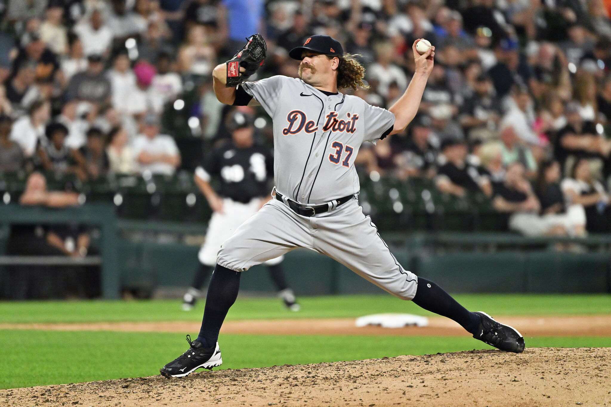 Andrew Chafin of the Arizona Diamondbacks delivers a pitch against News  Photo - Getty Images