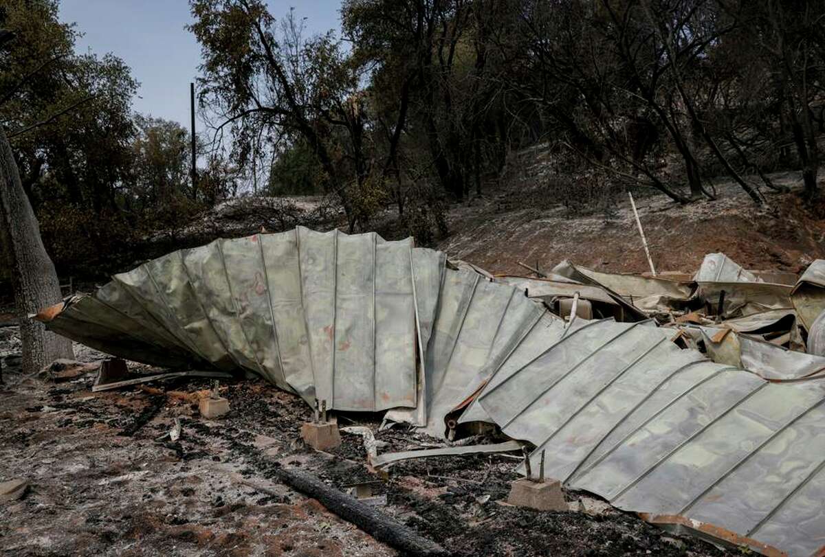 The once-standing home of Andrea and Steve Ward can be seen after flames from the Oak Fire swept through Triangle Road in Mariposa County, Calif. on Tuesday, July 26, 2022.