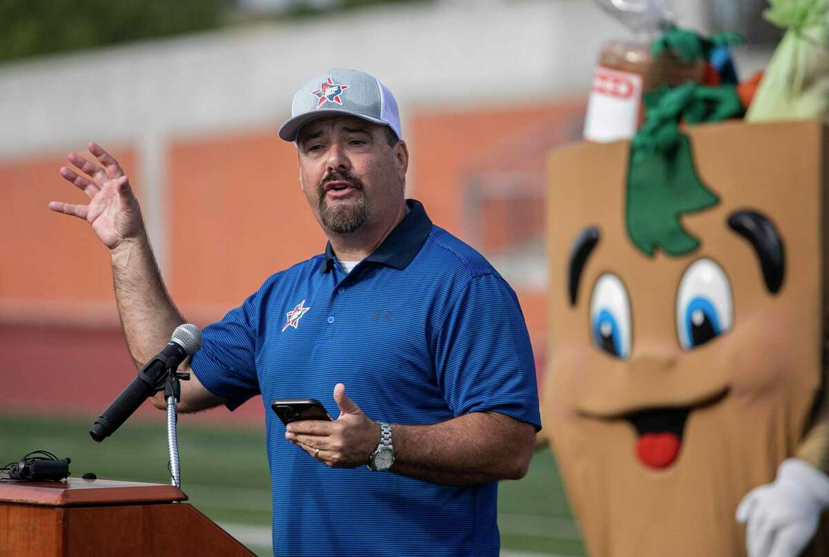 Steve Teel addresses the crowd during an event announcing this year’s Peanut Butter Bowl at Heroes Stadium in San Antonio, TX, on July 27, 2022. The Peanut Butter Bowl, started in 2016, is a series of local high school football games with23 local teams will donating their proceeds and jars of peanut butter to local food banks.