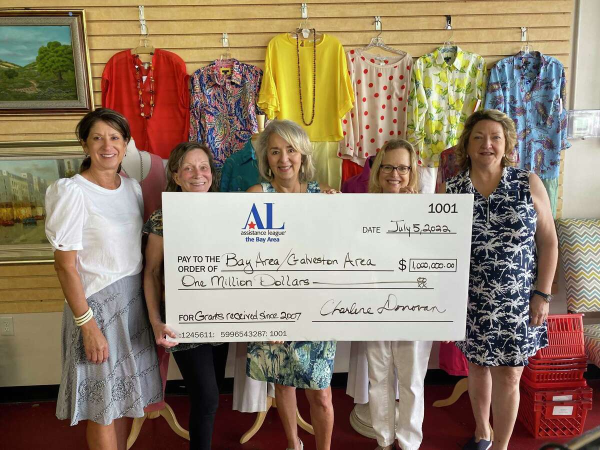 Assistance League of the Bay Area members hold a check recognizing $1 million in cumulative grants. From left are: Marie Keener, president; Sandra Kelver, vice president of resource development; Rebecca Saavedra, president-elect; Jennifer Maxwell, vice president of marketing; and Charlene Donovan, immediate past president.