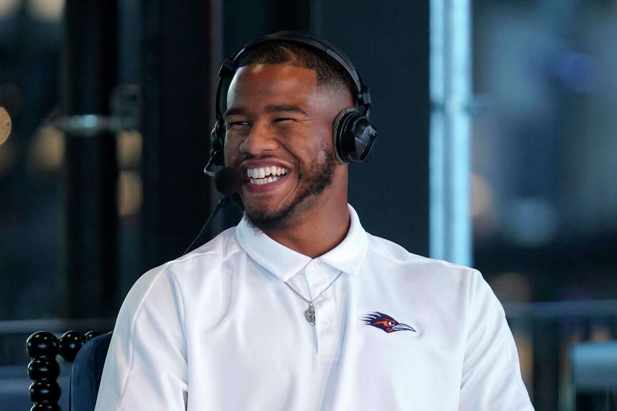 University of Texas San Antonio NCAA college football quarterback Frank Harris smiles as he responds to a question during a broadcasst interview during the Conference USA media day, in Arlington Texas, Wednesday, July 27, 2022. (AP Photo/Tony Gutierrez)