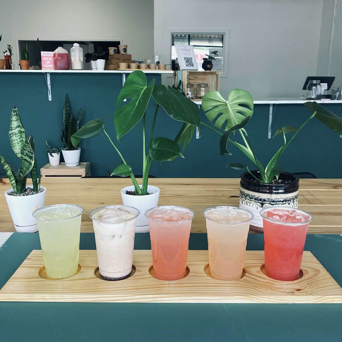 Elotitos sells a menu of aguas frescas along with corn in a cup.