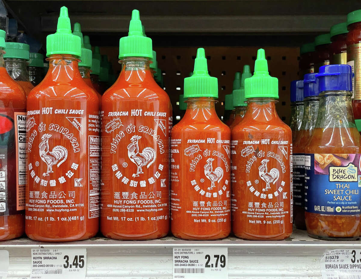 Due to a shortage of the chili peppers used to make Sriracha hot sauce, the popular condiment is becoming hard to find on store shelves. (Photo by Justin Sullivan/Getty Images)
