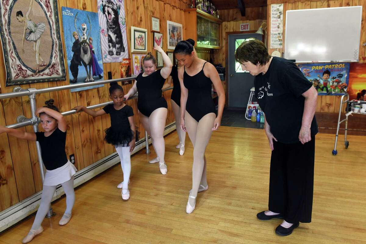 Jill Chase poses with some of her students at Jill Chase Dance Studio, in Shelton on July 22.