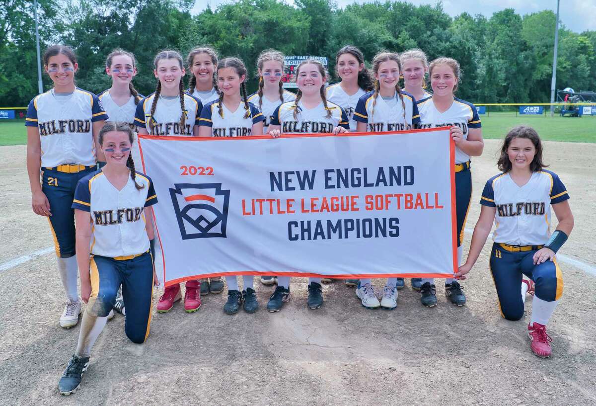 Members of the Milford Little League softball team celebrate after defeating Vermont in the New England Regional final Thursday to advance to the Little League World Series.