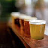 Close-up on a beer tasting sampler at a brewery bar - new experiences concepts