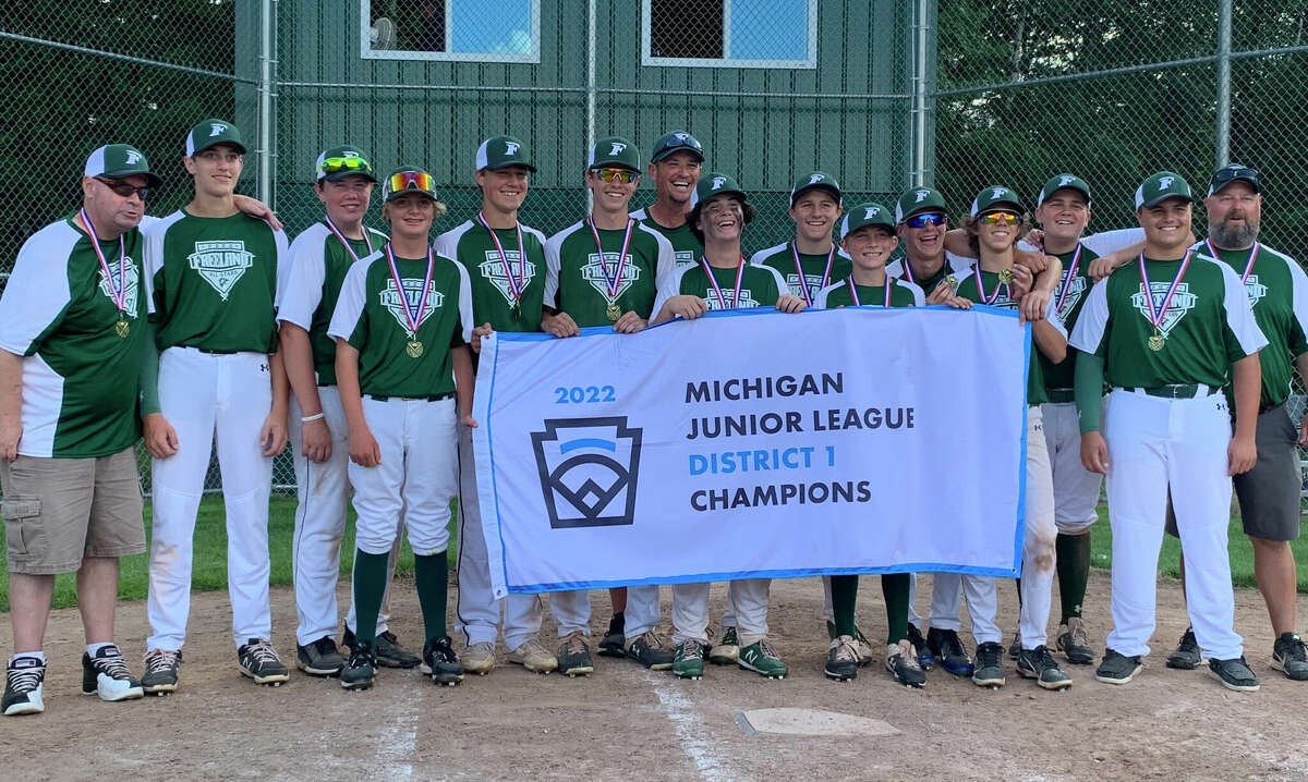Freeland's all-stars pose with the championship banner after beating Shepherd 9-3 in the Junior League Baseball district final Thursday at Larkin Township Park, July 28, 2022.