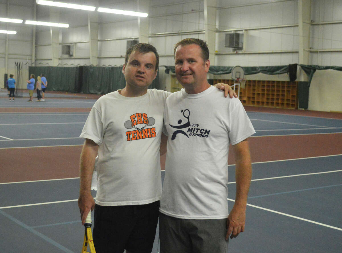 Pictured, from left to right, is Mitchell McGinnis and his father, Kevin McGinnis. Mitch 'n' Friends returned for its ninth year on Thursday, but this time inside the YMCA Meyer Center. 