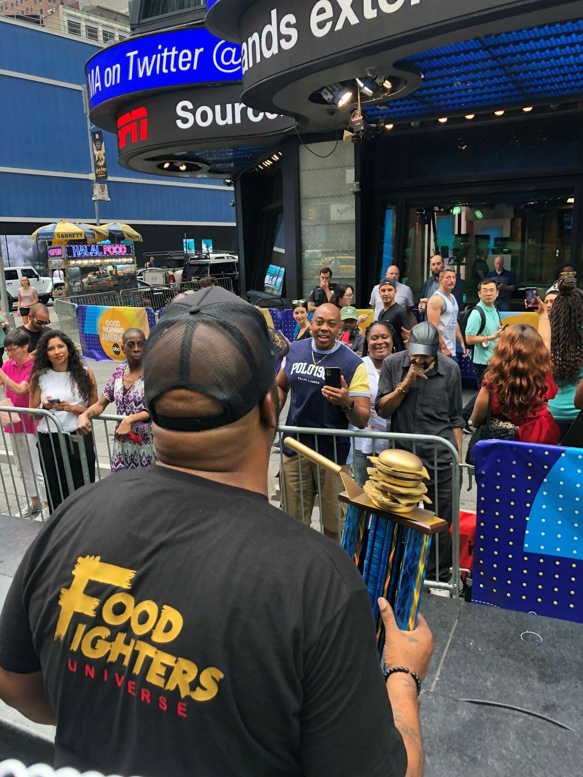 Houston rapper Bun B’s hoists the trophy for best burger in America on ABC's Good Morning America on July 29, 2022. Bun and chef Mike Pham won the award with their signature Trill Burger.