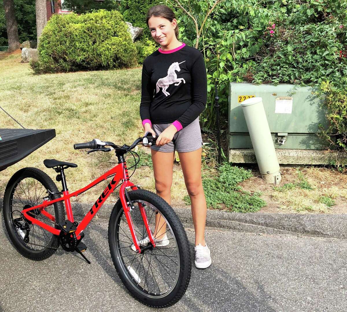 Beman Middle School student Kassidy of Middletown recently received a free BMX bike from Big Brothers Big Sisters of Connecticut.